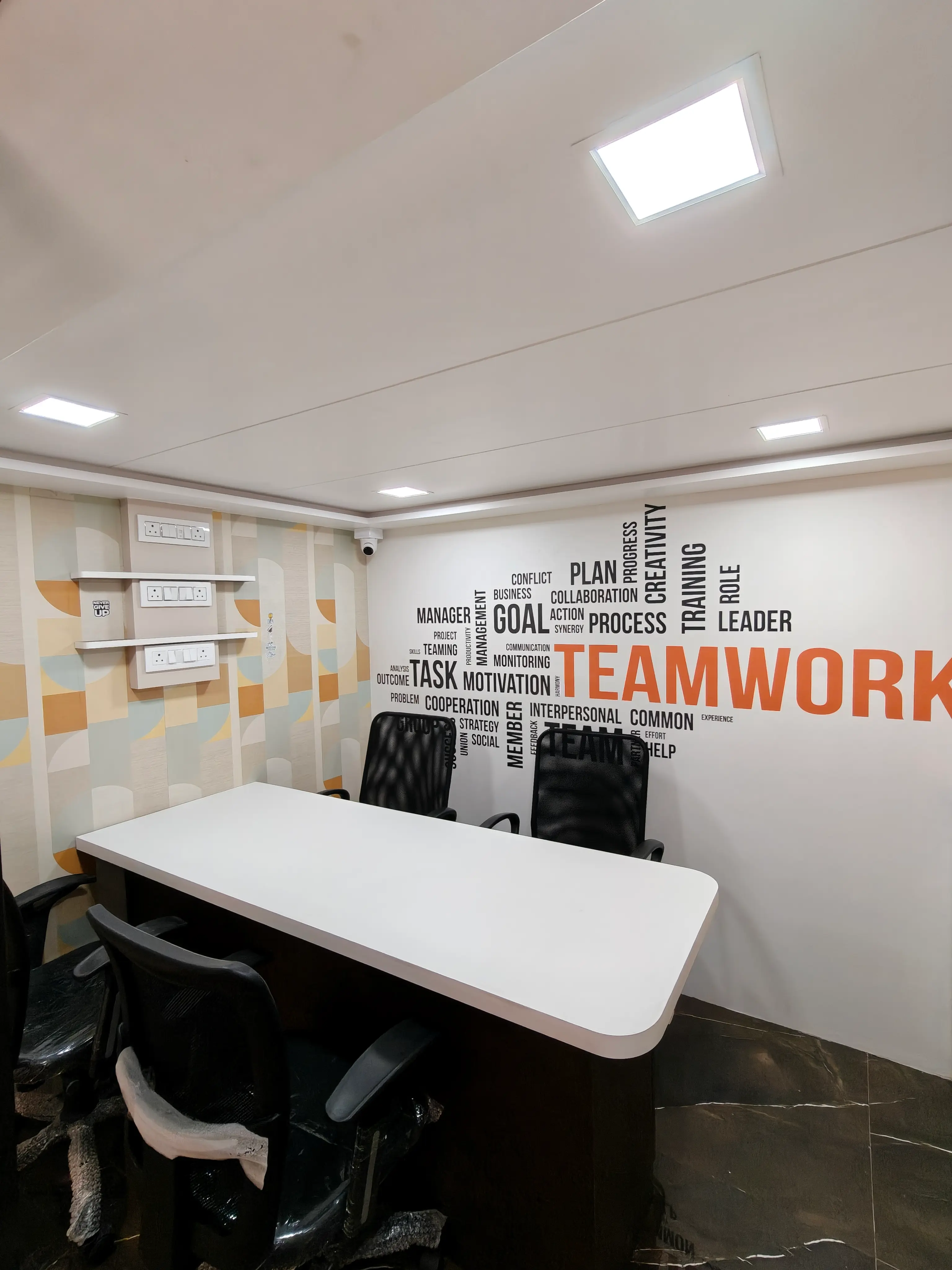 Deltron meeting room with teamwork wall art